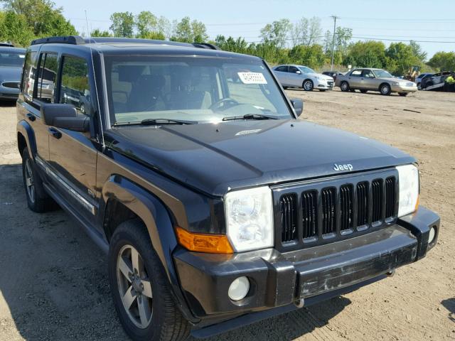 1J8HG48K76C338264 - 2006 JEEP COMMANDER BLACK photo 1