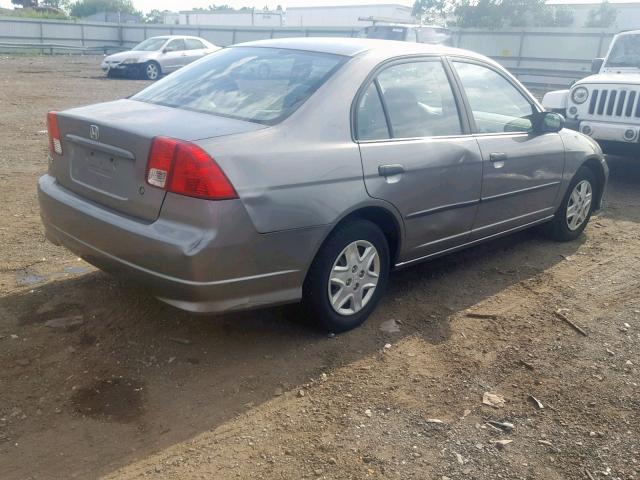 2HGES16305H560922 - 2005 HONDA CIVIC DX V SILVER photo 4