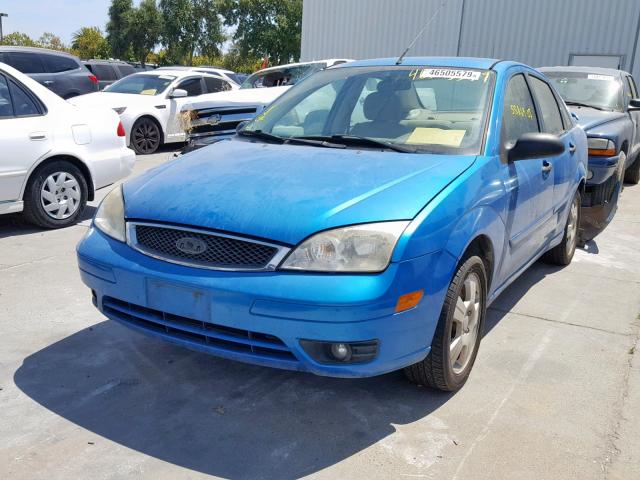 1FAHP34N27W347364 - 2007 FORD FOCUS ZX4 BLUE photo 2