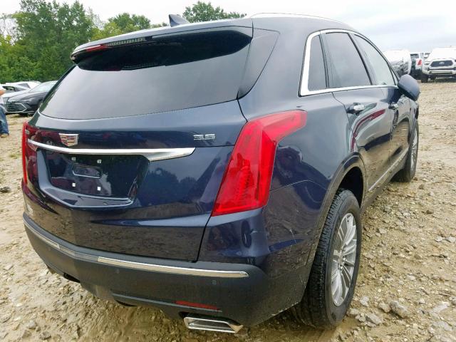 1GYKNCRS6KZ164085 - 2019 CADILLAC XT5 LUXURY BLUE photo 4