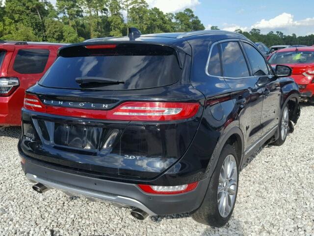 5LMCJ3C90HUL14878 - 2017 LINCOLN MKC RESERV BLACK photo 4