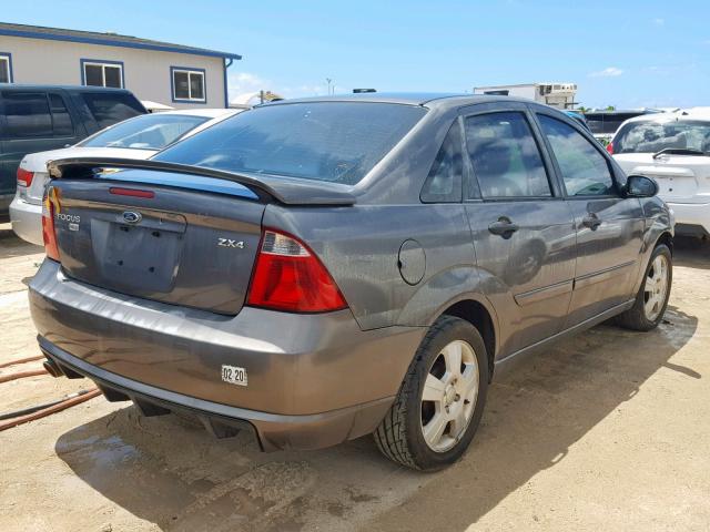 1FAHP34N46W118053 - 2006 FORD FOCUS ZX4 GRAY photo 4