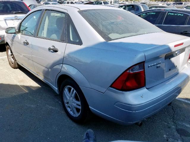 1FAFP34N95W214931 - 2005 FORD FOCUS ZX4 SILVER photo 3