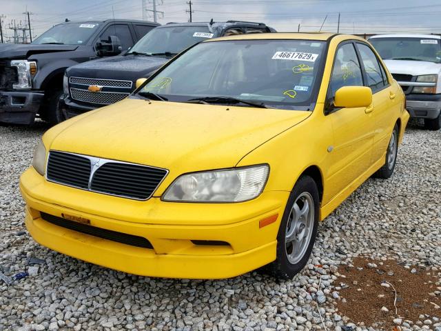 JA3AJ86E23U002590 - 2003 MITSUBISHI LANCER OZ YELLOW photo 2