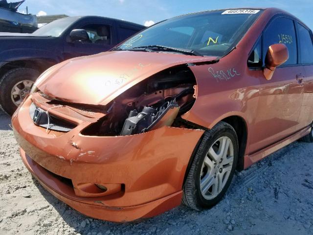 JHMGD38638S070300 - 2008 HONDA FIT SPORT ORANGE photo 9