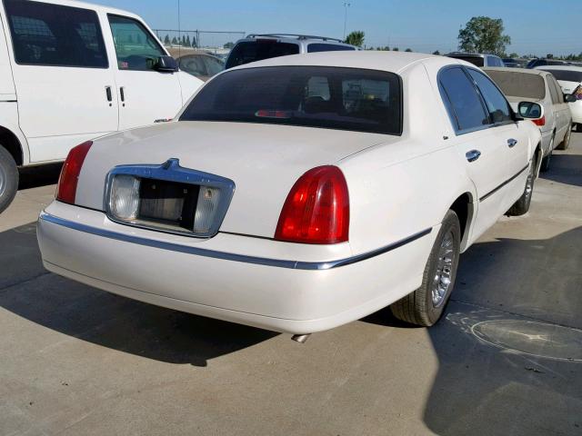 1LNHM83W2YY892184 - 2000 LINCOLN TOWN CAR C WHITE photo 4