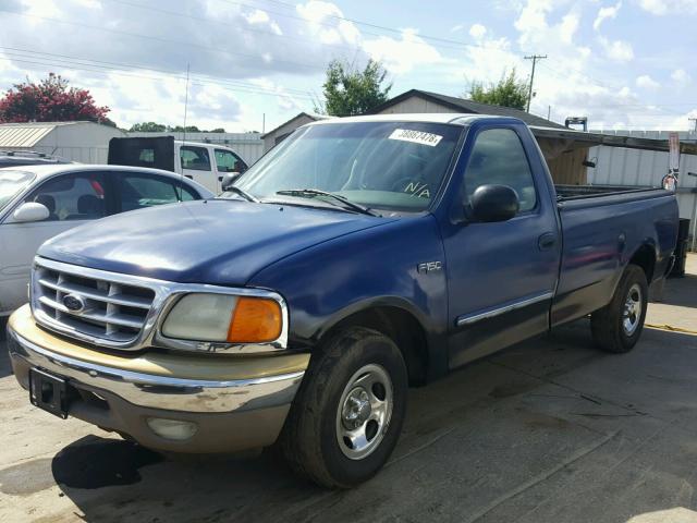 2FTRF17274CA91642 - 2004 FORD F-150 HERI BLUE photo 2