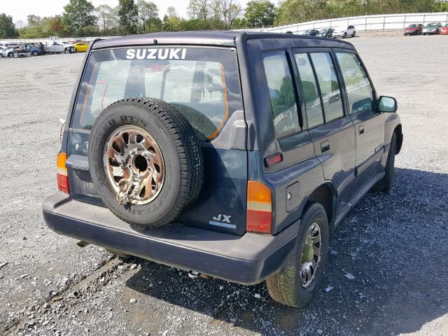 2S3TD03V1R6405198 - 1994 SUZUKI SIDEKICK J BLUE photo 4