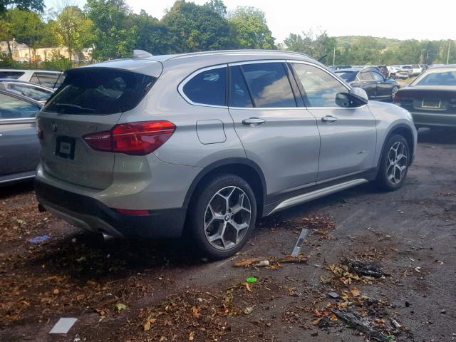 WBXHT3C30H5F84342 - 2017 BMW X1 XDRIVE2 SILVER photo 4