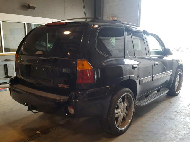 1GKDT13SX22236288 - 2002 GMC ENVOY BLACK photo 4