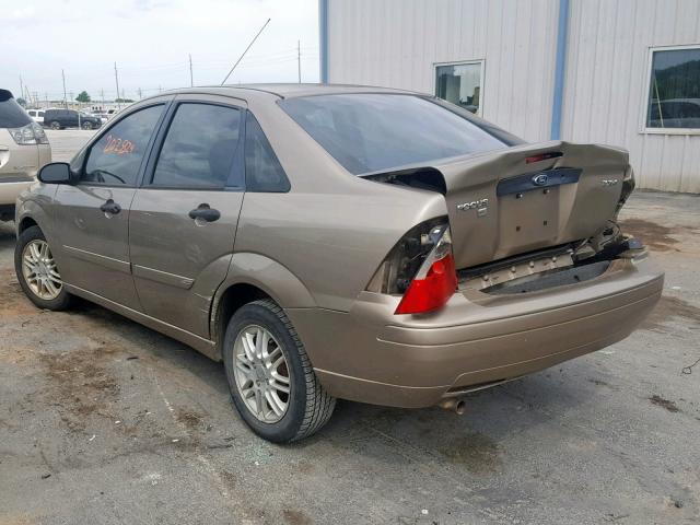 1FAFP34N15W261306 - 2005 FORD FOCUS ZX4 BROWN photo 3