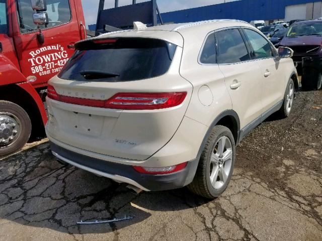 5LMCJ1D93JUL01065 - 2018 LINCOLN MKC PREMIE TAN photo 4