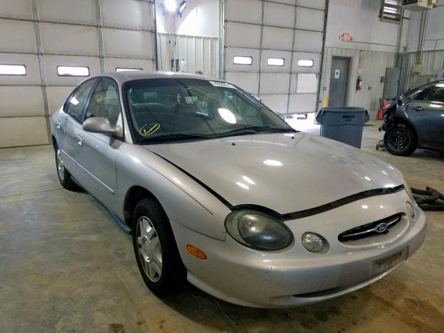 1FAFP53UXXA235355 - 1999 FORD TAURUS SE SILVER photo 1