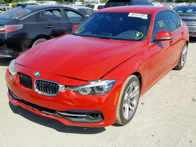 WBA8E1C52JA765219 - 2018 BMW 330E RED photo 2