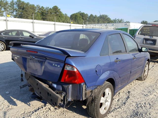 1FAFP34N15W234252 - 2005 FORD FOCUS ZX4 BLUE photo 4