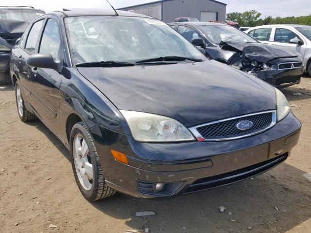 1FAHP34N97W212978 - 2007 FORD FOCUS ZX4 BLACK photo 1