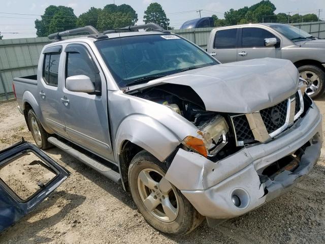 1N6AD07U06C468784 - 2006 NISSAN FRONTIER C SILVER photo 1