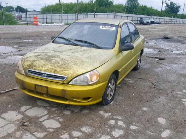 KNADC123716029349 - 2001 KIA RIO YELLOW photo 2