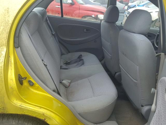 KNADC123716029349 - 2001 KIA RIO YELLOW photo 6