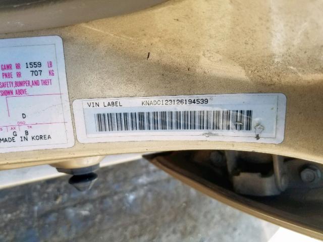 KNADC123126194539 - 2002 KIA RIO GOLD photo 10