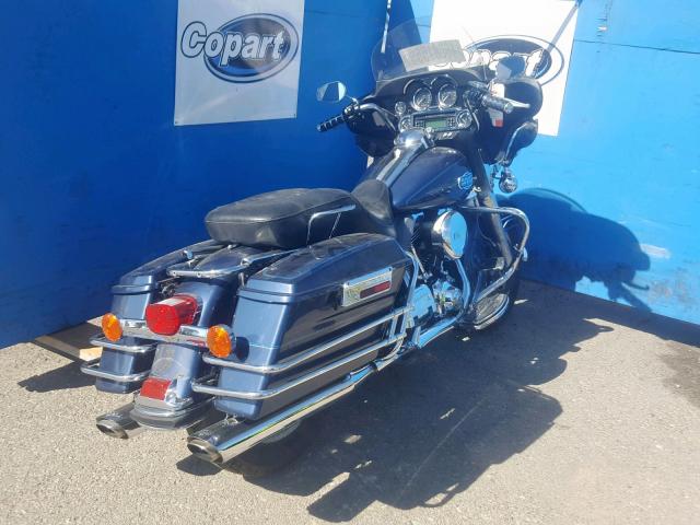 1HD1FC4168Y608737 - 2008 HARLEY-DAVIDSON FLHTCUI BLUE photo 4