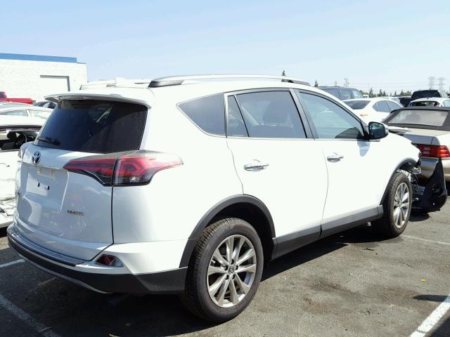 2T3YFREV5JW460990 - 2018 TOYOTA RAV4 LIMIT WHITE photo 4