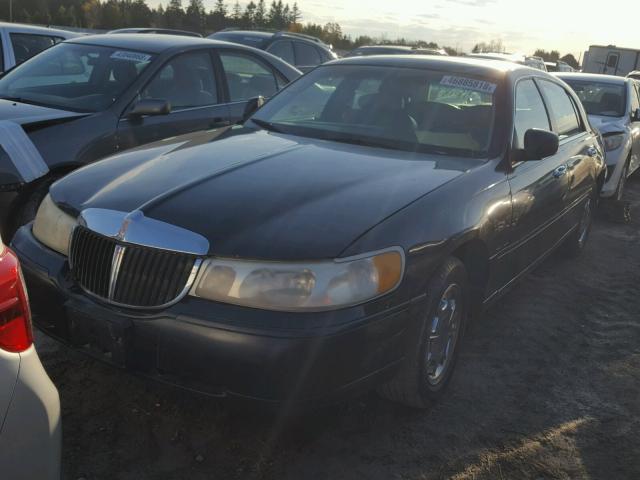 1LNFM82W2XY607376 - 1999 LINCOLN TOWN CAR S BLUE photo 2