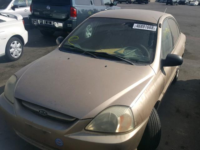 KNADC125136236565 - 2003 KIA RIO GOLD photo 2