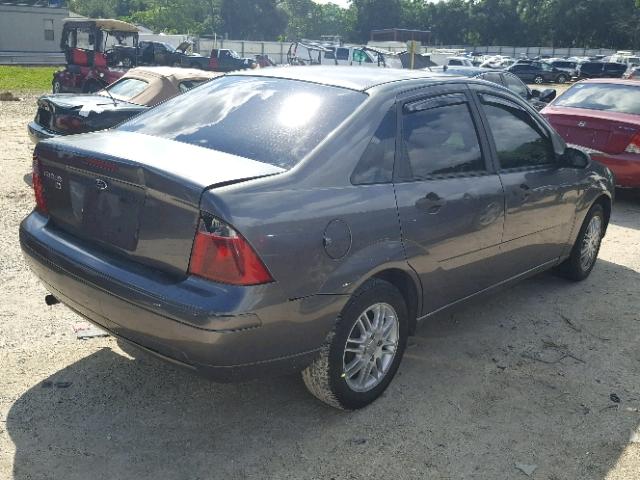 1FAFP34N37W154079 - 2007 FORD FOCUS ZX4 GRAY photo 4