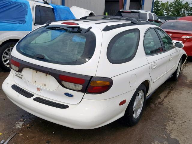 1FALP57U0VA167741 - 1997 FORD TAURUS GL WHITE photo 4