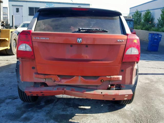 1B3HB48B68D733279 - 2008 DODGE CALIBER SX ORANGE photo 9