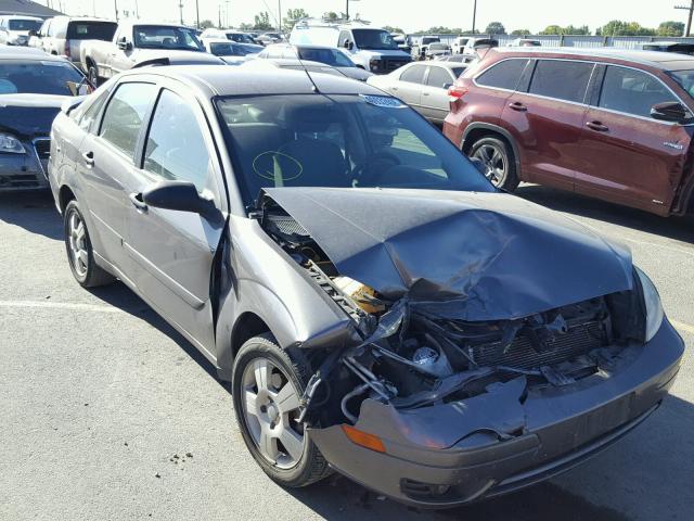 1FAFP34N67W150155 - 2007 FORD FOCUS ZX4 GRAY photo 1