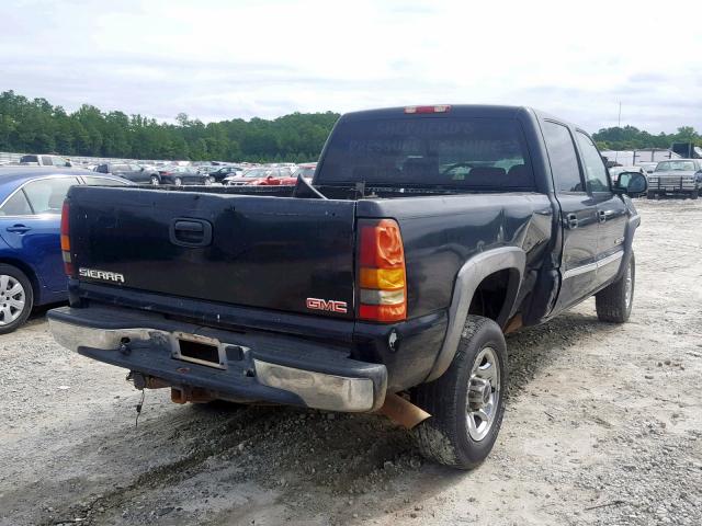 1GTHC23U74F158486 - 2004 GMC SIERRA C25 BLACK photo 4