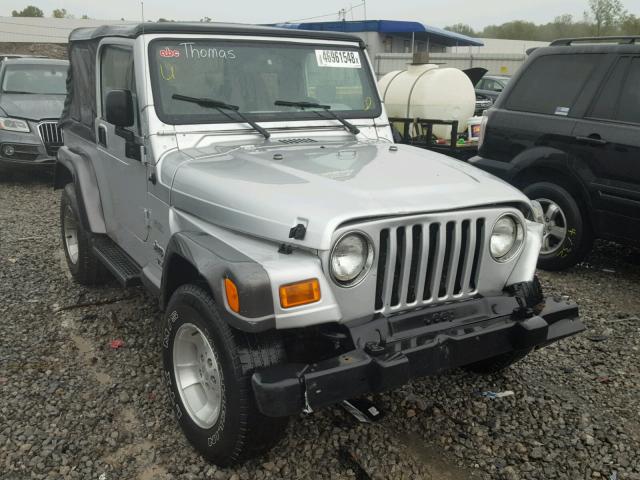 1J4FA49S94P729169 - 2004 JEEP WRANGLER / SILVER photo 1