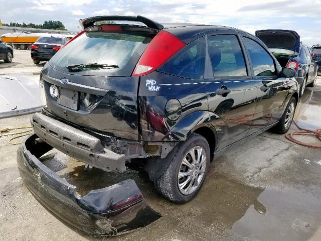 1FAHP37N77W286797 - 2007 FORD FOCUS ZX5 BLACK photo 4