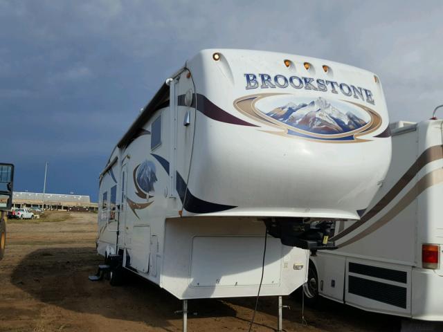 5ZT3BK2B5AA301522 - 2010 COACH BROOKSTONE WHITE photo 1