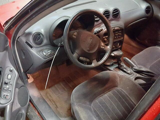 1G2NE52E7XC521761 - 1999 PONTIAC GRAND AM S წითელი ფოტო 9