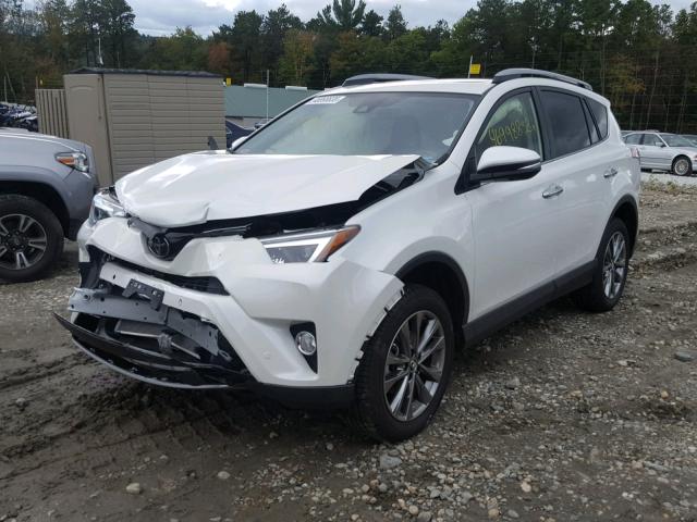 JTMDFREV7JJ212916 - 2018 TOYOTA RAV4 LIMIT WHITE photo 2