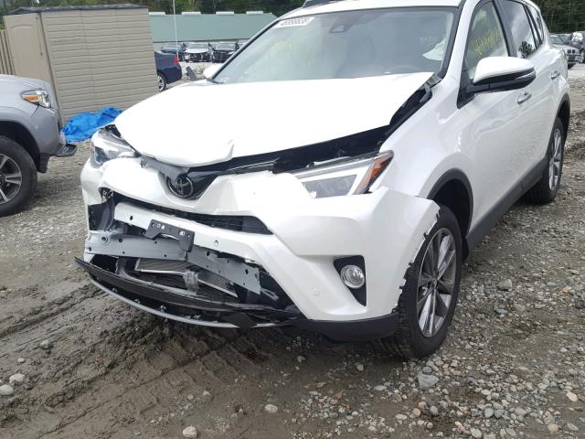 JTMDFREV7JJ212916 - 2018 TOYOTA RAV4 LIMIT WHITE photo 9