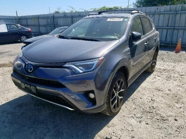 JTMJJREVXHD081085 - 2017 TOYOTA RAV4 HV SE GRAY photo 2