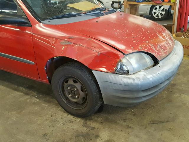 2S2AB21HXX6601860 - 1999 SUZUKI SWIFT BASE RED photo 9