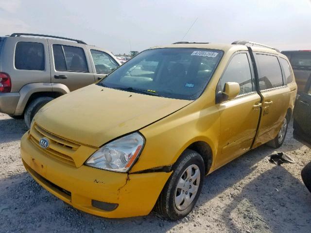 KNDMG4C36A6324692 - 2010 KIA SEDONA LX YELLOW photo 2