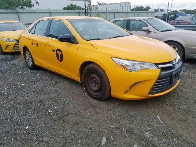 4T1BD1FK4FU152713 - 2015 TOYOTA CAMRY HYBR YELLOW photo 1