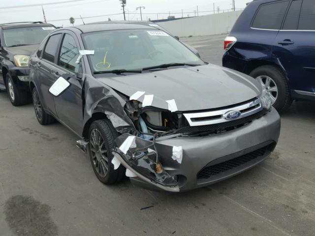 1FAHP3GN0AW292061 - 2010 FORD FOCUS SES GRAY photo 1