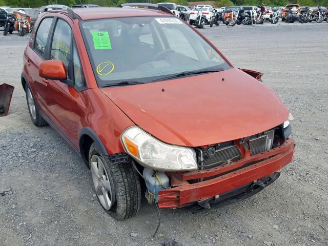 JS2YB417795100196 - 2009 SUZUKI SX4 TOURIN ORANGE photo 1