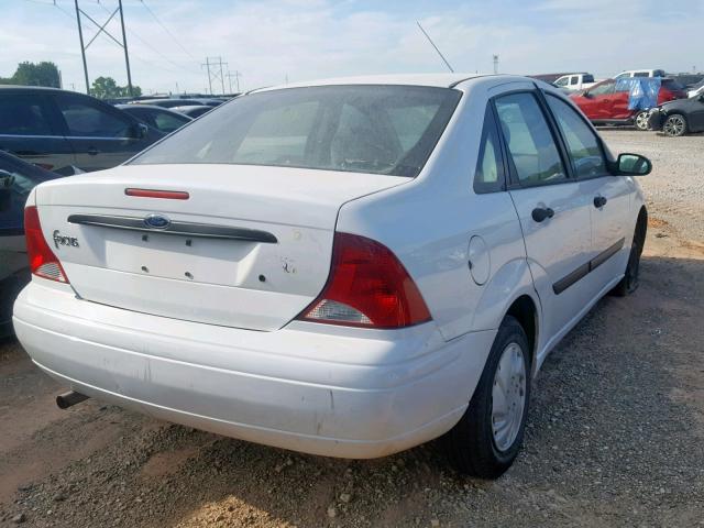 1FAFP33P34W143520 - 2004 FORD FOCUS LX WHITE photo 4