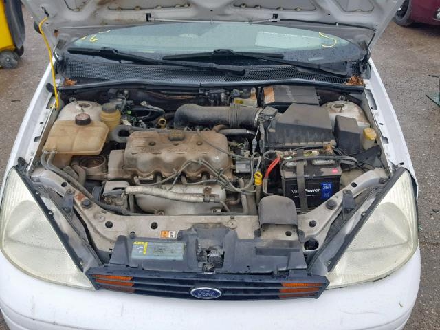 1FAFP33P34W143520 - 2004 FORD FOCUS LX WHITE photo 7