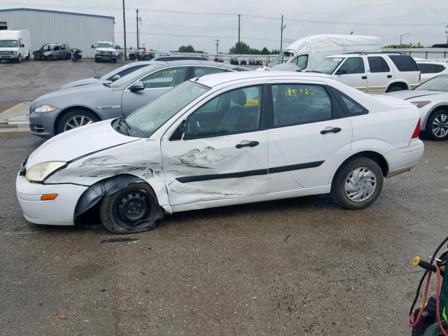 1FAFP33P34W143520 - 2004 FORD FOCUS LX WHITE photo 9