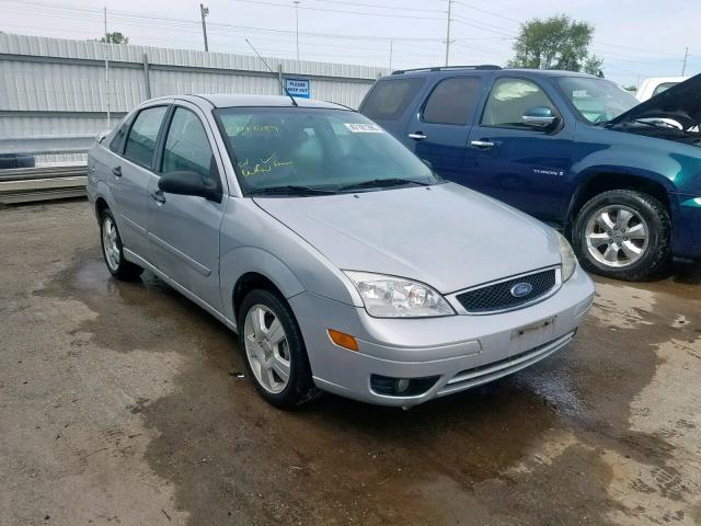 1FAFP34N77W111445 - 2007 FORD FOCUS ZX4 SILVER photo 1