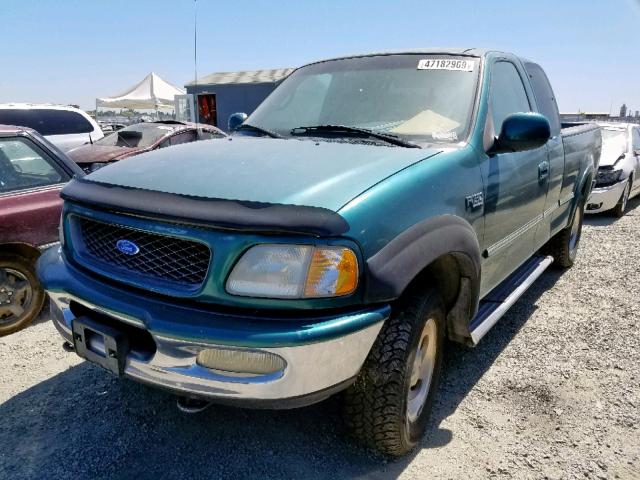 1FTDX1861VKA01276 - 1997 FORD F150 GREEN photo 2